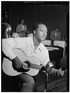 Josh White, Café Society (Downtown), New York, N.Y., ca. June 1946 (William P. Gottlieb 09091).jpg