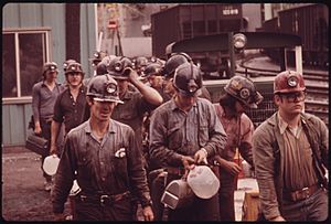 MINERS LINE UP TO GO INTO THE ELEVATOR SHAFT AT THE VIRGINIA-POCAHONTAS COAL COMPANY MINE ^4 NEAR RICHLANDS, VIRGINIA... - NARA - 556338