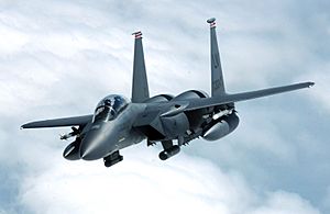 F-15E Strike Eagle banks away from a tanker