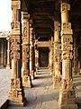 Intricate stone carvings in the cloister of Quwwat ul-Islam mosque, near Qutub Minar