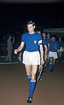 Giacinto Facchetti wearing the classic Italian uniform in 1968: blue shirt, white shorts and blue socks and the tricolour badge.