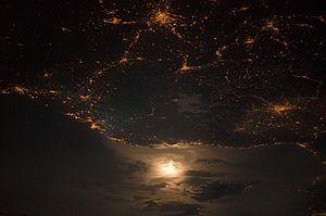 City Lights at Night along the France-Italy Border