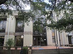 Trees shield the Caldwell Parish Courthouse in Columbia, constructed in 1937 and renovated in 1971.