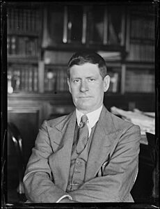 Premier Thomas Bavin sitting in his office, Sydney, ca. 1930