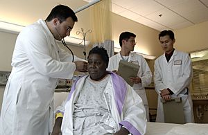 Doctor examines patient