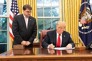 Donald Trump and Robert Wilkie