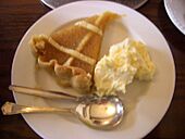 Treacle Tart with clotted cream.jpg