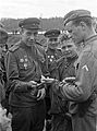 Officers comparing watches