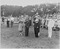 Photograph of President Truman and other dignitaries saluting during the President's review of the 442nd Regimental... - NARA - 199387