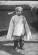 Chinese American child in embroidered jacket