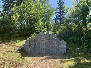 Preparing to Cross the Sacred River by Marianne Nicolson at the Indigenous Art Park ᐄᓃᐤ (ÎNÎW) River Lot 11∞