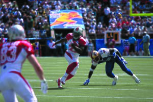 Ronnie Brown maneuvers past Patrick Willis - 2009 Pro Bowl