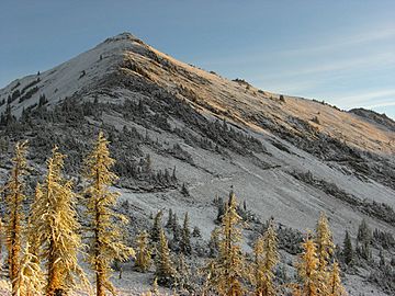 Sunrise hits Tatie Peak (5038438596).jpg