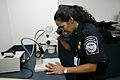 CBP checking authenticity of a travel document