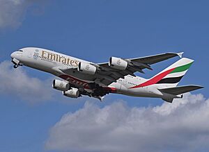 Emirates Airbus A380 (A6-EDS) departs London Heathrow 11April2015