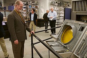 Larry Niven admiring SAGE console