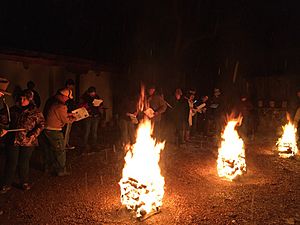 Singing and luminarias