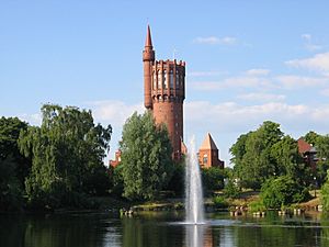 The old water tower viewed across St. Olof's lake