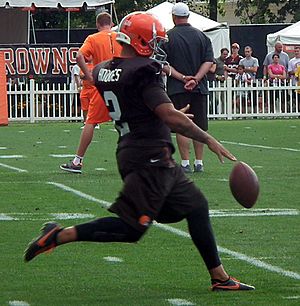 Reggie Hodges practicing punting