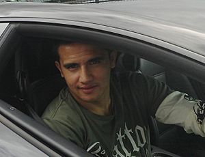 Tim Cahill in his Bugatti Veyron