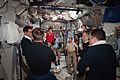 STS-135 and Expedition 28 crews after the hatch opening