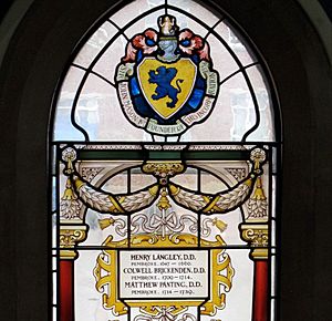 Photograph of stained glass with the name of Henry Langley engraved.jpg
