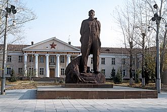 RIAN archive 440214 A monument to Kurchatov on the background of the Semipalatinsk nuclear test site's Central Staff