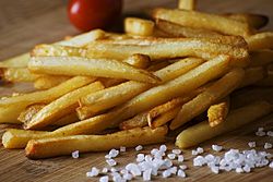 French fries on a paper plate