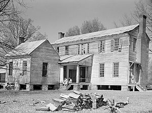 Rear view of the detached kitchen and former plantation home of the Mark Pettway family, called Sandyridge, in Boykin April 1937. The house was demolished a short time later.  Photographed by Arthur Rothstein.