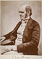 Charles Darwin seated