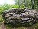 Photograph of a furnace used to melt whale blubber left by the Basques on Île aux Basques