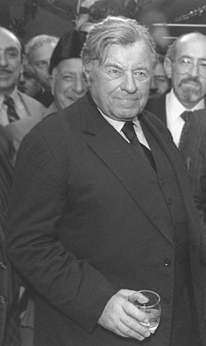 Teddy Kollek during a Christmas eve cocktail party.jpg