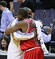 Mike James hugs Lindsey Hunter