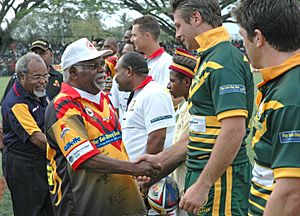 Using sport to raise awareness of HIVAIDS in PNG. PNG Prime Minister and Governor General meet the teams. PNG 2005. Photo- AusAID (10686918175)