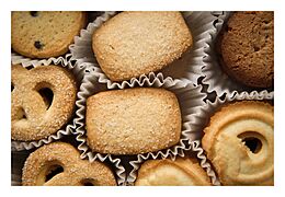 Danish butter cookies in container with wrappers, December 2009