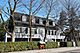 Louis Bertrand House surrounded by trees