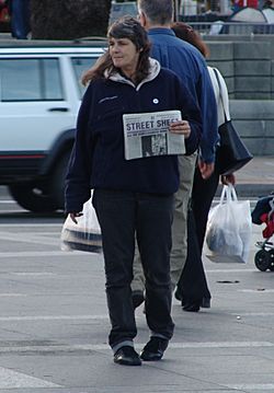 Street-sheet-saleswoman-crop