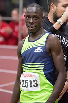 Edward Cheserek running the indoor mile at the 2018 BU David Hemery Valentine Invitational (6).jpg