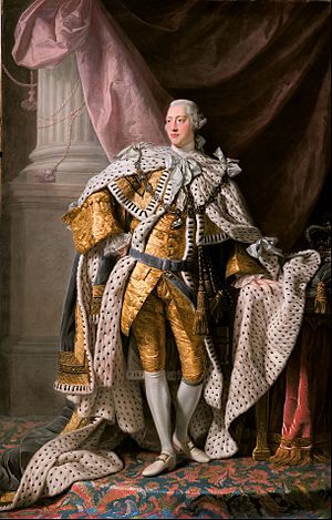 Full-length portrait in oils of a clean-shaven young George in eighteenth century dress: gold jacket and breeches, ermine cloak, powdered wig, white stockings, and buckled shoes.