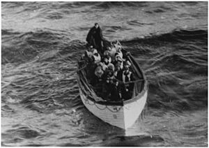 Photograph of a Lifeboat Carrying Titanic Survivors - NARA - 278337