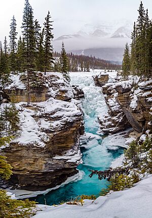 Waterfall in winter with snow and ice