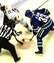 Henrik Sedin Saku Koivu faceoff