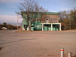 The Shamrock Museum building was originally a general store.    Building from 1927, said to be an abandoned auto dealership.