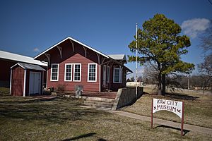 The 1903 Santa Fe Depot, moved before the original townsite was flooded, now part of the Kaw City Museum.