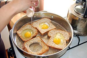 Making eggs in basket