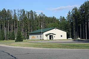 Town hall nestled in the forest typical of the town