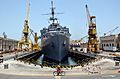 US Navy 030715-N-0111R-001 A Maltese shipyard worker heads home on his bicycle after a day's work on USS La Salle (AFS 3)