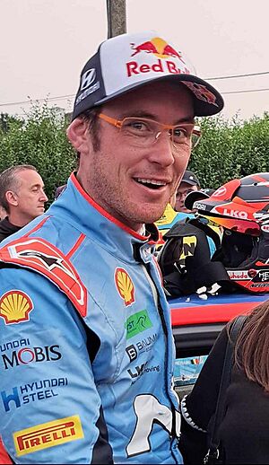 Headshot of Thierry Neuville in sports gear.