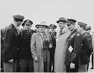 Photograph of President Truman with Secretary of the Air Force Stuart Symington and a number of military officers, at... - NARA - 200087