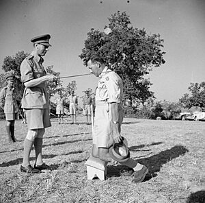 George VI knighting General Leese Jul 1944